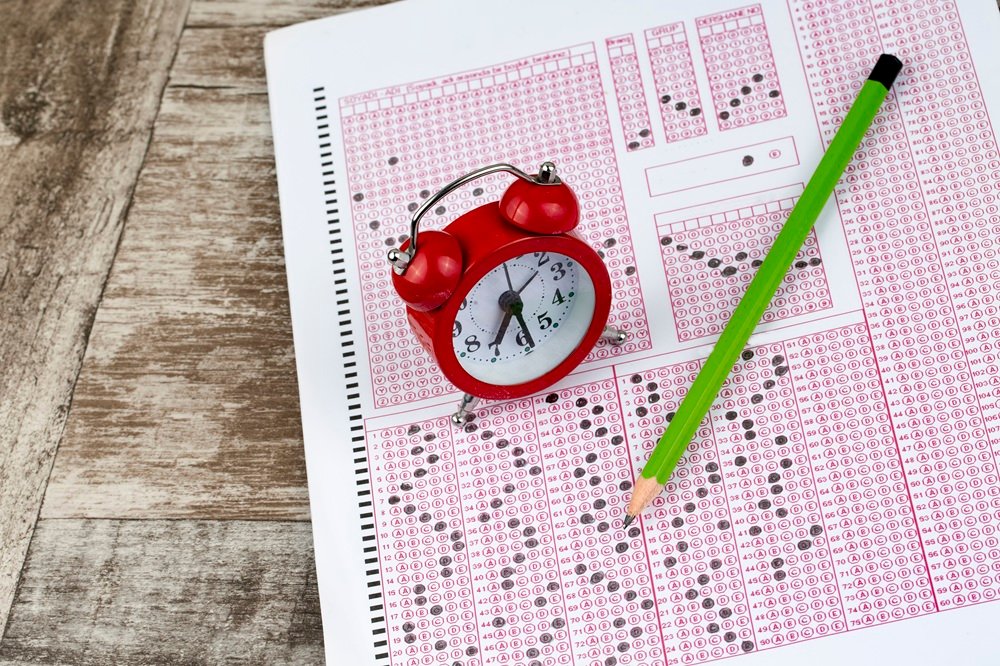 OMR answer sheet with examination clock