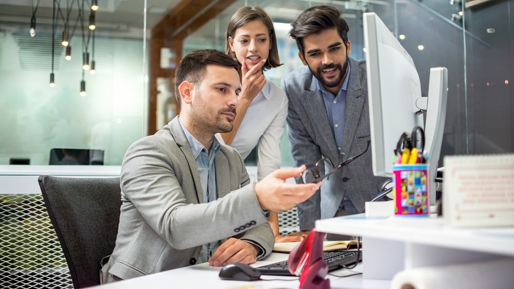 Professionals collaborating on website and digital development